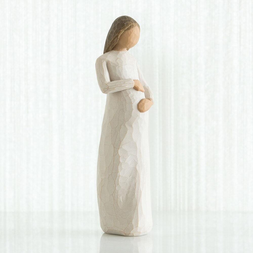 Cherish by Willow Tree. Standing pregnant female figure in cream dress, with both hands on belly