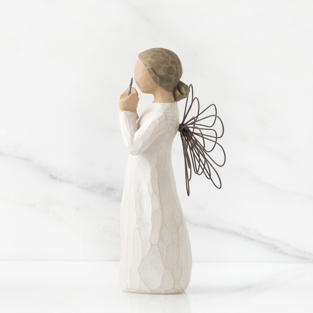 Bright Star Angel by Willow Tree. Standing angel in cream dress with wire wings, holding glitter wire star in her hands