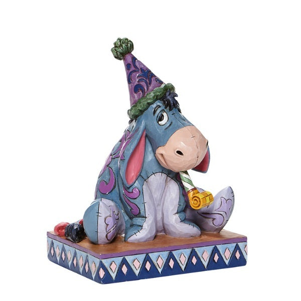 DISNEY TRADITIONS<BR> Eeyore with Birthday Hat/Horn <BR> “Birthday Blues"